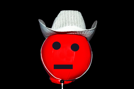 Feeling on Red ball wear white hatの写真素材