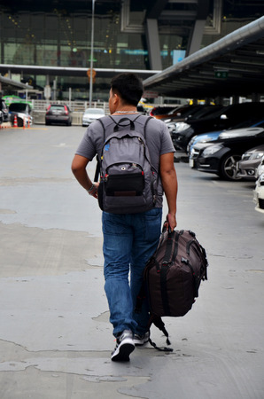 Thai people and foreiner traveller wait and walk at Suvarnabhumi Airport Station on October 8, 2015 in Bangkok, Thailand.のeditorial素材