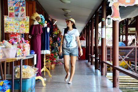 People travel and shopping at Thung Bua Chom floating market on December 3, 2015 in Ayutthaya, Thailand.のeditorial素材