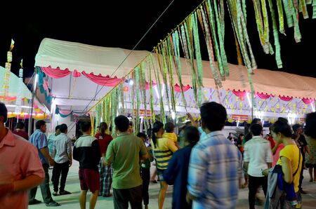 People join Kathin merit ceremony and praying with buddha statue at Wat Lam Pho in  annual festival...
