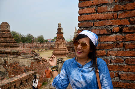 Thai woman portrait at ancient building at Wat Mahathat on February 29, 2016 in Ayutthaya, Thailandのeditorial素材