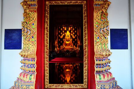Golden buddha statue in church of Wat Phra That Suthon Mongkhon Khiri in Phrae, Thailandの写真素材