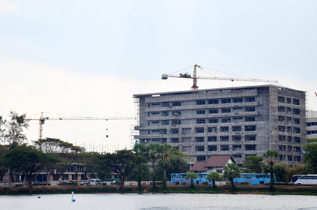 View of building construction site at riverside of Nong Han lake from ship go to Donsawan island on January 15, 2016 in  Sakon Nakhon, Thailandのeditorial素材