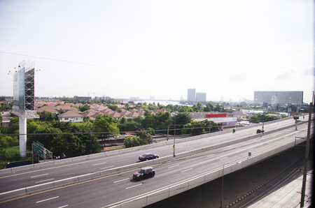 View of Nonthaburi city from MRT Purple Line skytrain running go to Bangkok in Nonthaburi Province,...