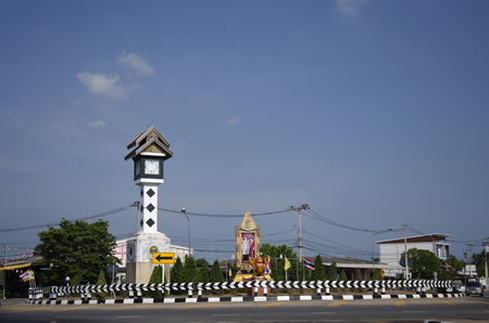 Motion at Traffic road with ancient clock tower roundabout of Baan Pho on May 19, 2016 in Samut Sakhon, Thailandのeditorial素材