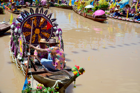 Thai people join in traditional parade procession lent candle festival for Buddhist Lent Day in...