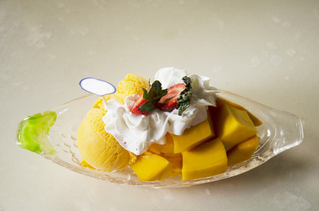 Mango Cheese Bingsoo or Shaved ice fruit and wipcream at restaurant in Malaysiaの写真素材