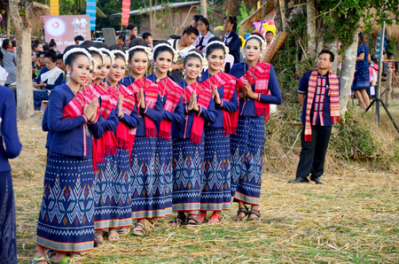 Phu tai people wear clothes national costume phu thai for show and join phu thai world day festival at Ban Non Hom on January 16, 2016 in Sakon Nakhon, Thailandのeditorial素材