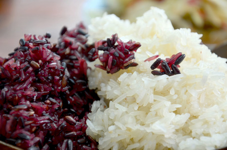Glutinous rice and black sticky rice for eat with som tum or Green Papaya Salad Recipe and other food lao style in Pakse, Champasak, Laos.の写真素材