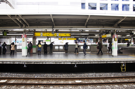 Japanese people and foreigner traveller waiting train and subway at Ikebukuro station in Shinjuku city of Kanto region on October 19, 2016 in Tokyo, Japanのeditorial素材
