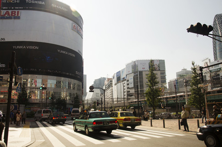 Japanese people waiting traffic signs for walk crossover traffic road with cityscape at Shinjuku district on October 20, 2016 in Tokyo, Japanのeditorial素材