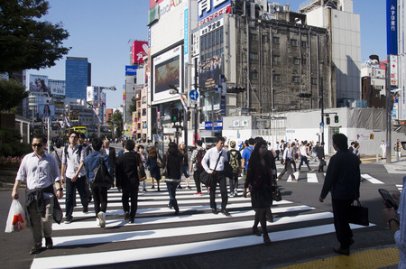 Japanese people walking crosswalk traffic road at shinjuku city on October 20, 2016 in Tokyo, Japan.のeditorial素材