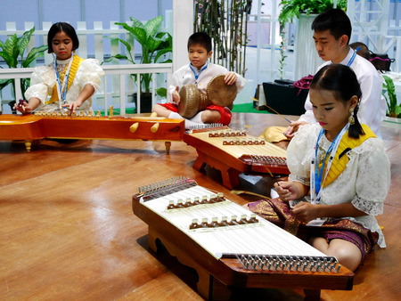 Thai student band playing traditional thai musical instrument concert show people in traditional culture thai festival on November 16, 2016 in Nonthaburi, Thailandのeditorial素材