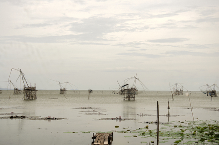 View landscape of fishing lift and dip net machine in Pakpra canal at Ban Pak Pra fishing village in...