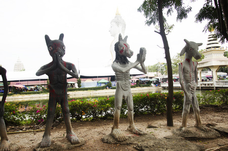 People pray and visit statues of ghost and zombie (Preta) in place of departed spirits or hell land at Wat Phai Rong Wua on January 7, 2017 in Suphan Buri, Thailandのeditorial素材