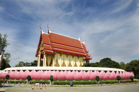 Beautiful ubosot or church of Wat Muang for people praying and visit with clouds and sky at outdoor in Ang Thong, Thailandの写真素材