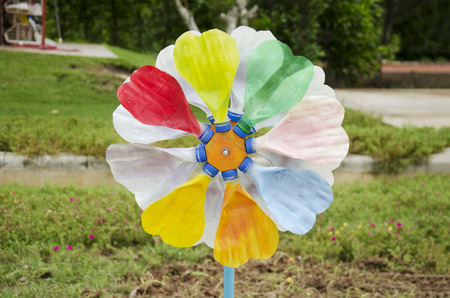 Colorful pinwheel and windmill toy made from plastic bottle recycleの写真素材