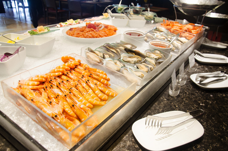 Cuisine seafood line at food buffet service for people serve in restaurant of Hotel in Thailandの写真素材