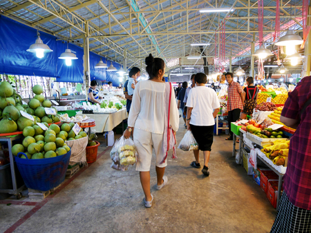 Asian thai women and people travel and shopping product and food from local shop at Don Wai Floating Market on March 27, 2017 in Nakhon Pathom, Thailand.のeditorial素材