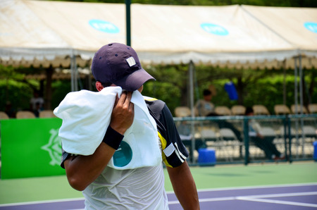 Athlete thai people and athlete foreigner people playing tennis and join in race championship on May 14, 2016 at Bangkok, Thailandのeditorial素材