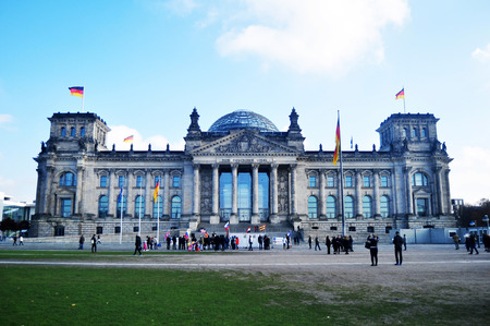 German people and foreigner travelers walk and posing for take photo at front of Reichstag building is historic edifice at Berlin on November 9, 2016 in Berlin, Germanyのeditorial素材
