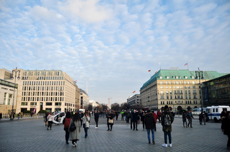 German people and foreigner travelers walking on free space for travel and visitat front of Brandenburg Gate of Berlin city on November 9, 2016 in Berlin, Germanyのeditorial素材