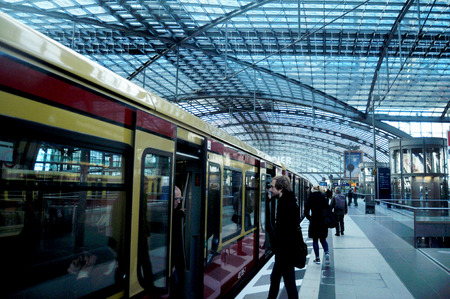 German people and foreigner travelers passengers walking up and down train inside of Berlin Hauptbahnhof Railway Central Station on November 9, 2016 in Berlin, Germanyのeditorial素材