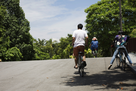 Travelers people walking and biking bicycle in Sri Nakhon Khuean Khan Park and Botanical Garden or khung bang kachao park on August 9, 2017 in Samut Prakan, Thailandの写真素材