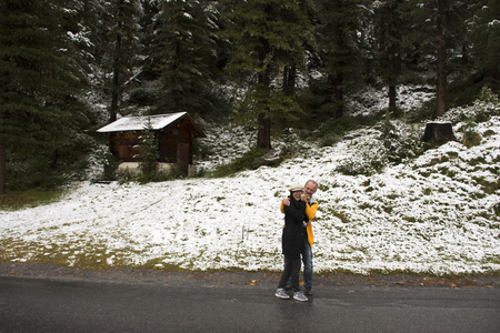 German and thai people travel and playing snow at top of mountain in Kaunergrat nature park while snowing on September 3, 2017 in Tyrol, Austriaのeditorial素材