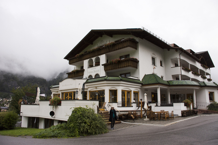 Asia thai women travel and posing at hotel resort in Pfunds in morning time after rested on September 3, 2017 in Tyrol, Austriaのeditorial素材