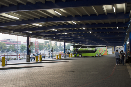 German people and foreigner passengers wait and walk at Mannheim bus station near Mannheim train station on August 29, 2017 in Mannheim, Germanyのeditorial素材