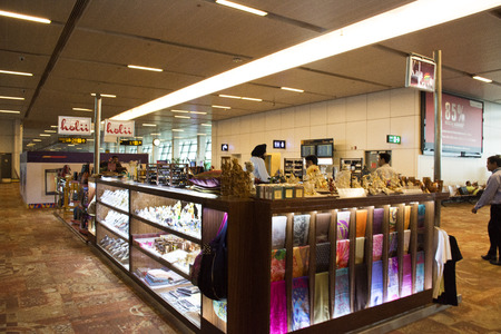Indian people and foreigner travelers walking visit and shopping duty free inside of Indira Gandhi International Airport on August 23, 2017 in Delhi, Indiaのeditorial素材