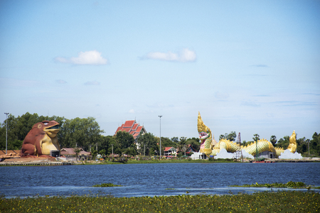 View landscape of Chi River with Naga statue and Phaya Tan public park and Phayakunkak Museum National or Toad Museum in Yasothon, Thailandのeditorial素材