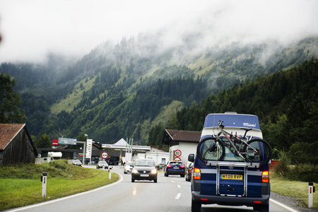 Travelers people driving car on the road passed Bichlbach city go to Pfunds village on September 2, 2017 in Tirol region, Austrian のeditorial素材