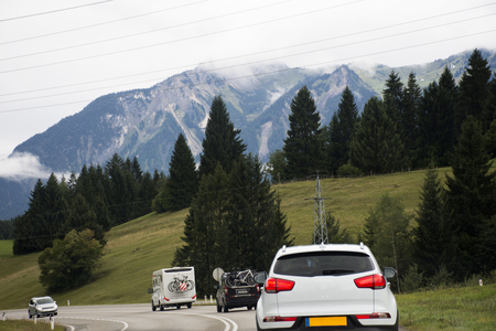 Travelers people driving car on the road passed Bichlbach city go to Pfunds village on September 2, 2017 in Tirol region, Austrian のeditorial素材