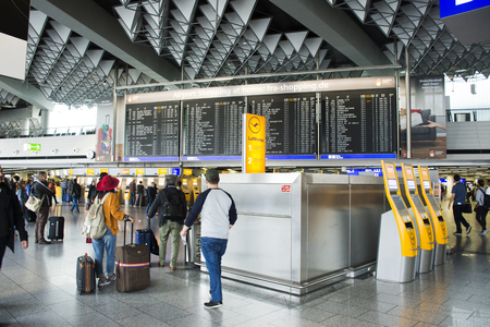 German and foreigner traveler wait flight with passenger arriving and departing at Frankfurt International Airport on September 10, 2017 in Frankfurt, Germanyのeditorial素材