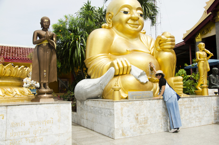 Thai women people visit and respect praying Katyayana or Gautama Buddha thai name called Phra sangkatjay at Wat Sakae Krang on July 19, 2017 at Uthai Thani, Thailandのeditorial素材
