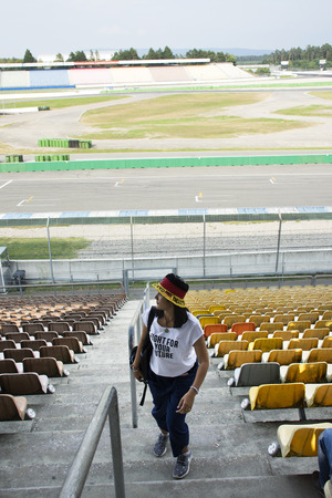 Traveler thai women visit and posing for take photo in Hockenheimring a motor racing course at Hockenheim city on August 27, 2017 in Stuttgart, Germanyのeditorial素材