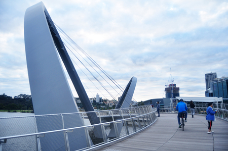 Australian people and foriegner travelers walking and looking view cityscape and landscape at Elizabeth Quay Bridge crossing swan river on May 29, 2016 in Perth, Australiaのeditorial素材