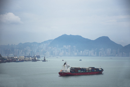 View landscape and cityscape of Hong Kong island from bus between sending people from airport to central and causeway bay on September 3, 2018 in Hong Kong, Chinaのeditorial素材