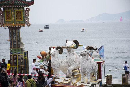 Chinese and travelers people visit and respect pray chinese god and angel in Tin Hau Temple or Kwun Yam Shrine at Repulse Bay on September 9, 2018 in Hong Kong, Chinaのeditorial素材