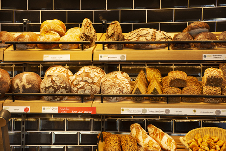 Bakery bread shop and cafe for sale german people and foreigner travelers at heidelberger market square or marktplatz on August 25, 2017 in Heidelberg, Germanyのeditorial素材