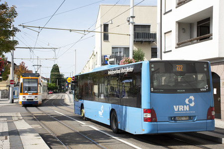 Tramway run and stopping for send and receive passengers German people and foreign travelers in station at Sandhausen village on August 25, 2017 in Heidelberg, Germanyのeditorial素材