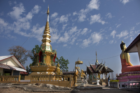 Stupa chedi and buddha statue images in Wat Phrachao Thanchai and Phra That San Kwang temple for thai people and foreigners travelers visit and respect praying at Chiangrai city in Chiang Rai, Thailandの写真素材