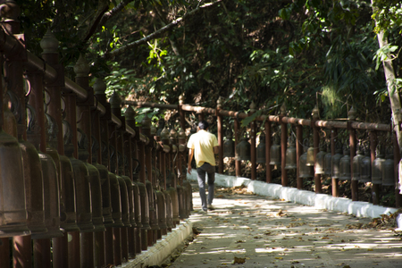Many big metal bell at Wat Phra That Doi Tung in Chiang Rai, Thailand for Thai people and traveler foreigner travel visit and knock respect prayingの写真素材