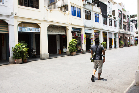 Chinese people and foreigner travelers travel and walk visit on Paifang Street in old town and ancient city center of Chaozhou at Teochew on May 8, 2018 in Guangdong, Chinaのeditorial素材