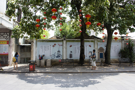 Chinese people and Travelers thai women with men walking travel visit on Paifang Street in old ancient town at Chaozhou or Teochew city on May 8, 2018 in Guangdong, Chinaのeditorial素材