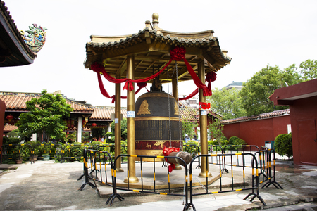 Big metal bell for chinese people and travelers foreigner travel visit and knock respect praying at Kaiyuan Temple at Chaozhou or Teochew on May 8, 2018 in Guangdong, Chinaのeditorial素材