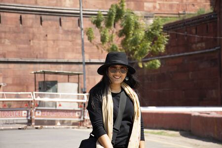 Travelers thai women journey visit and travel for take photo with Red Fort or Lal Qila at the...