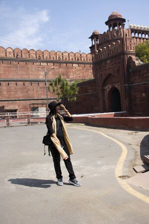 Travelers thai women journey visit and travel for take photo with Red Fort or Lal Qila  at the...